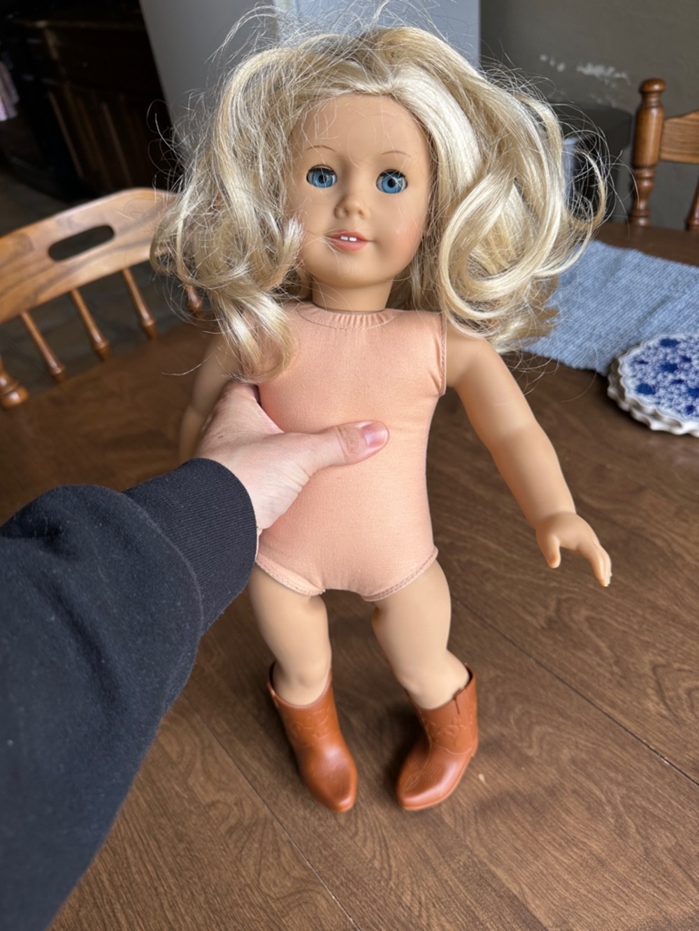 American girl, doll blonde hair, blue eye